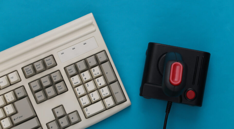 old keyboard old fashioned joystick retro gaming 80s top view flat lay