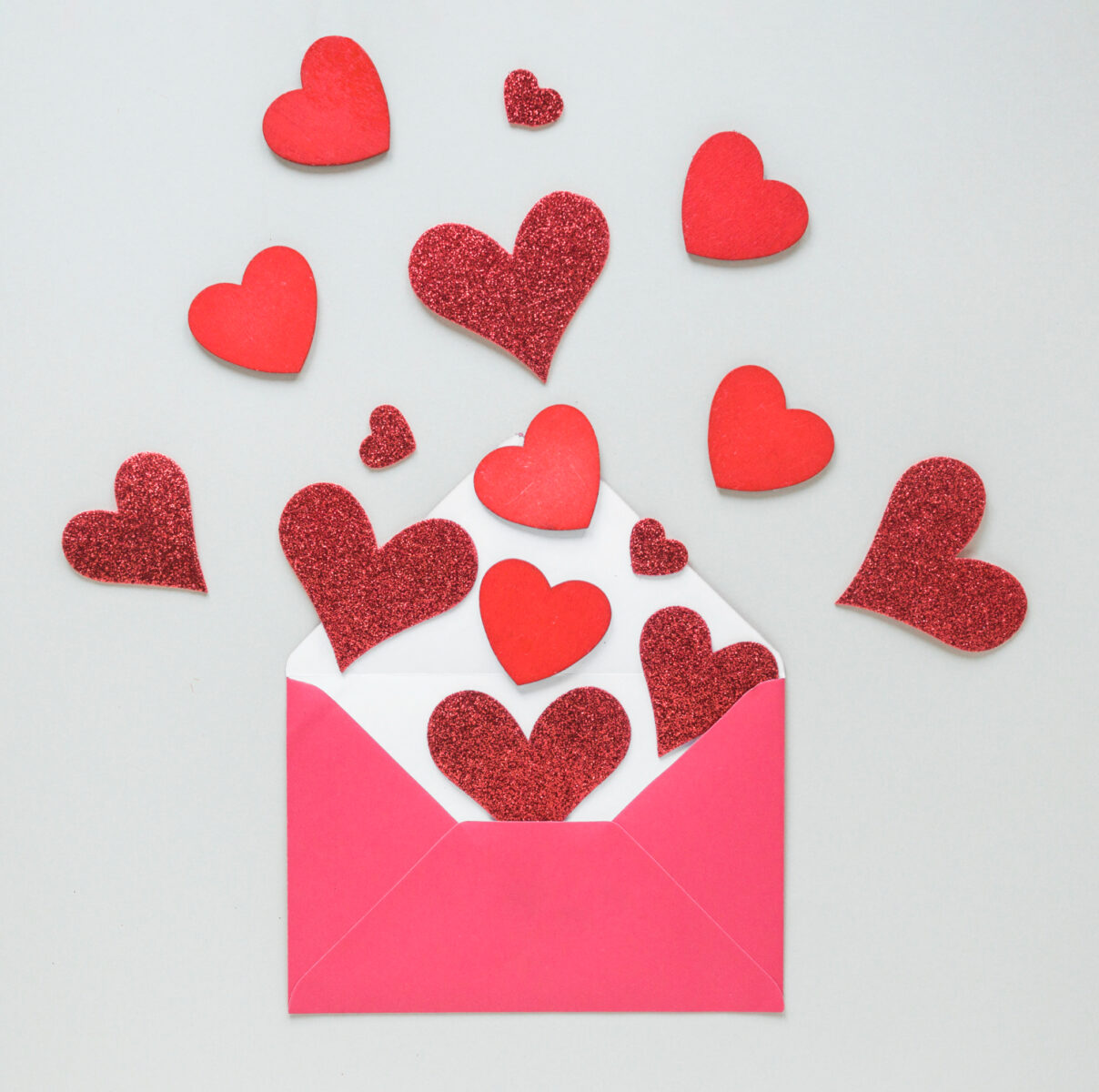 paper hearts scattered from envelope from lyssa