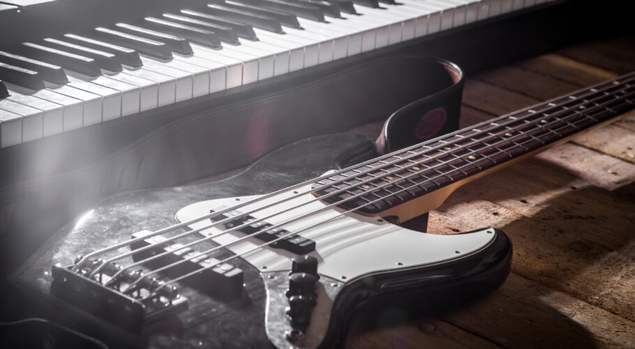 piano guitar wooden background closeup