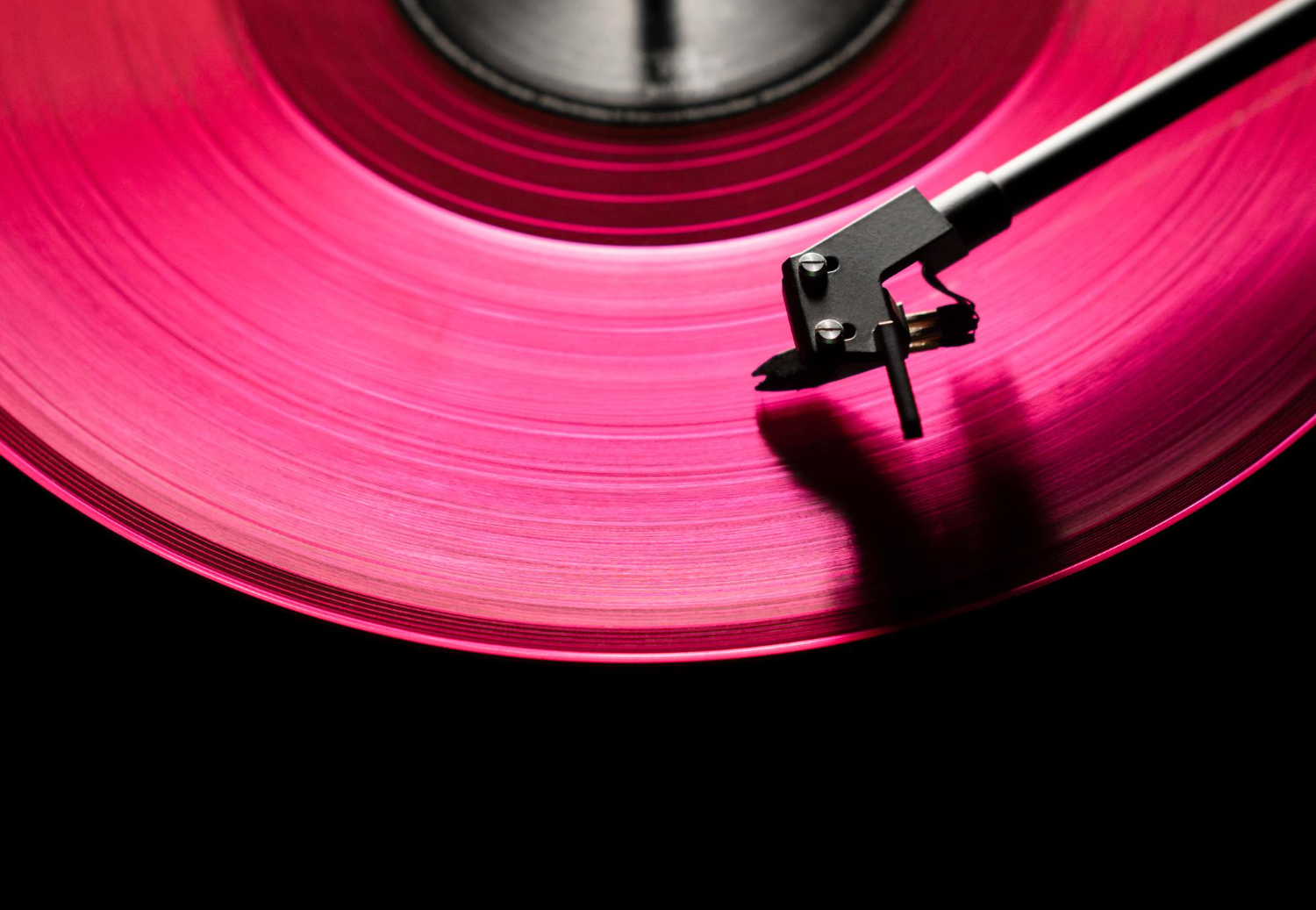 pink vinyl disc close up rap hip hop music black background