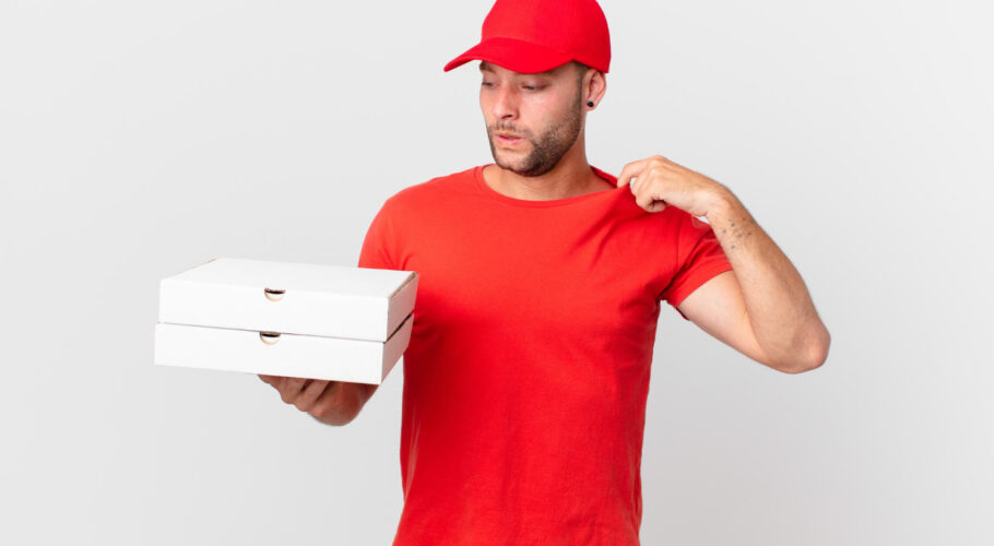 pizza delivery man feeling stressed and anxious delivering pizzas