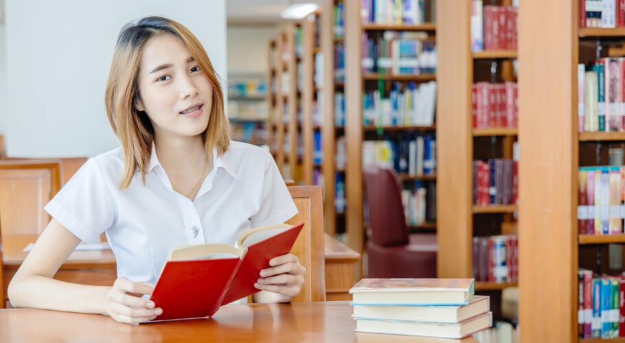 portrait asian university teen girl library happy smile china
