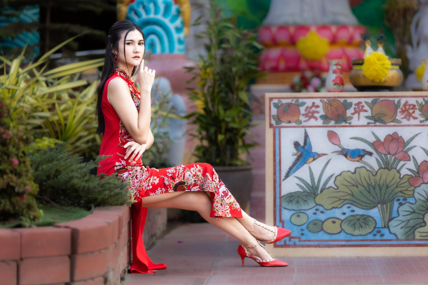 portrait beautiful smiles asian young woman in china wearing red cheongsam dress traditional decoration