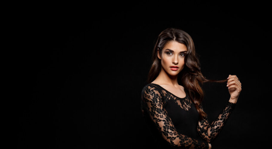 beautiful woman dina black dress dark wall)