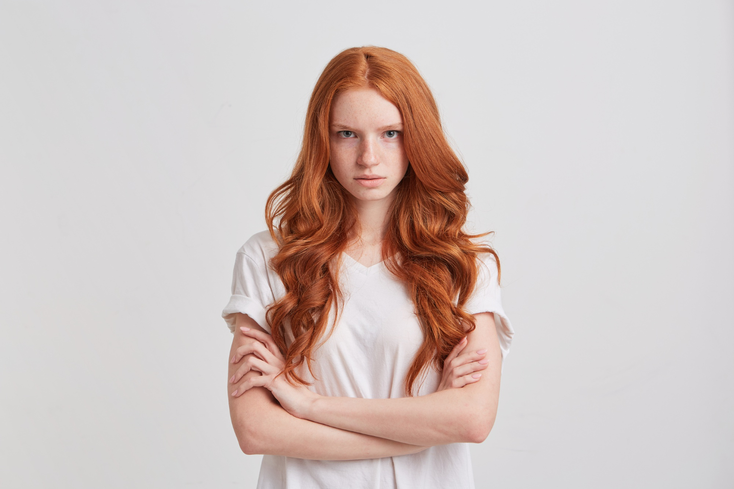 portrait cheerful pretty redhead young woman with long wavy hair kathryn looking upset