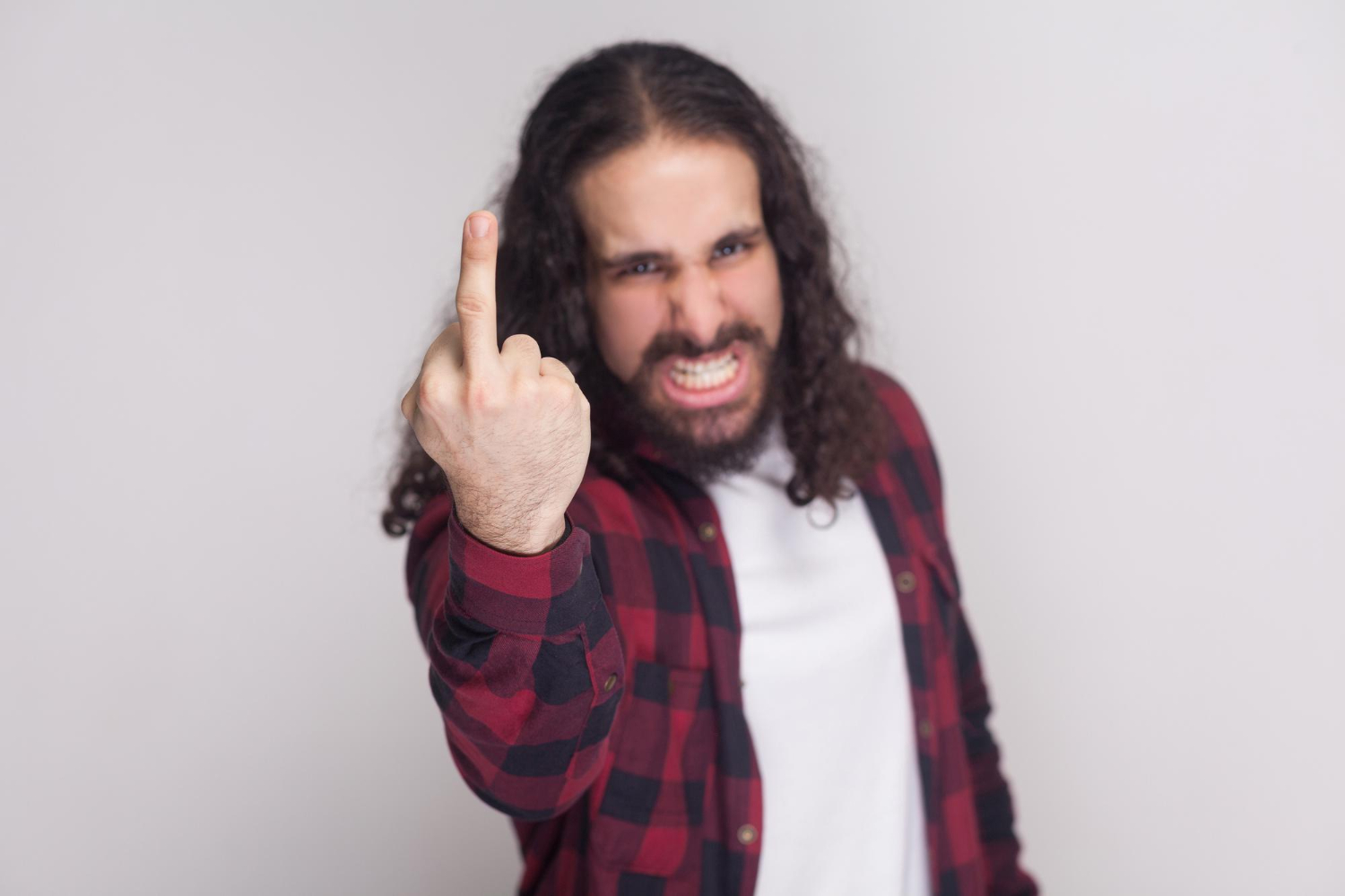 portrait happy handsome man with beard black long curly hair