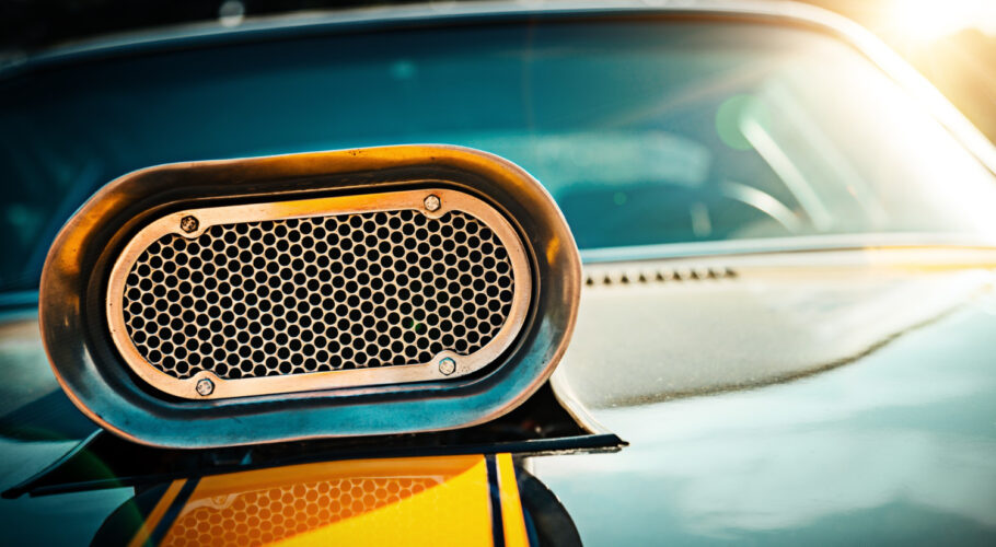 powerful muscle car closeup photo hood