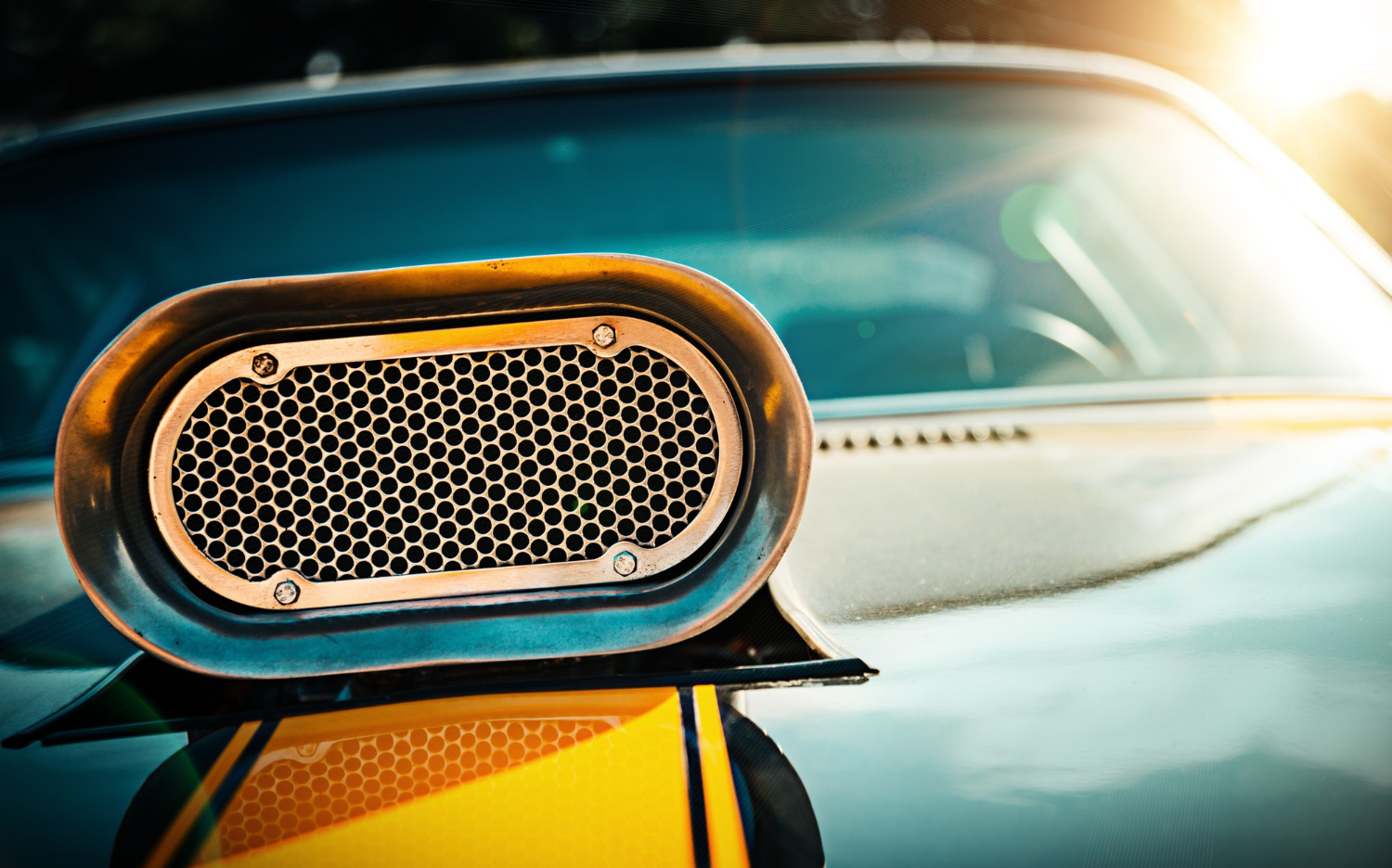 powerful muscle car closeup photo hood