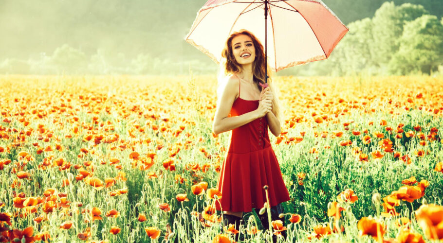 pretty happy girl field poppy seed with umbrella