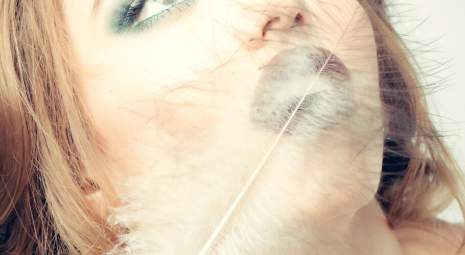 pretty woman with feather