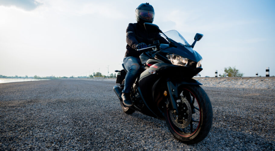rider motorbike road riding having fun driving empty road shawn