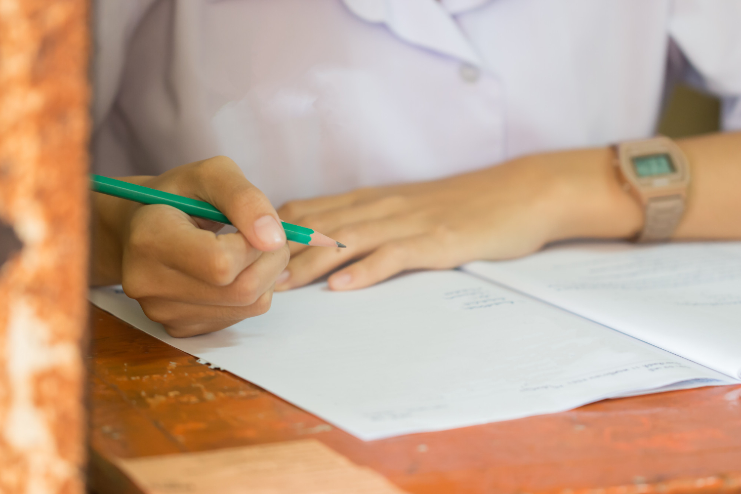 school university students hands taking exams writing examination room with holding pencil sheet lyssa