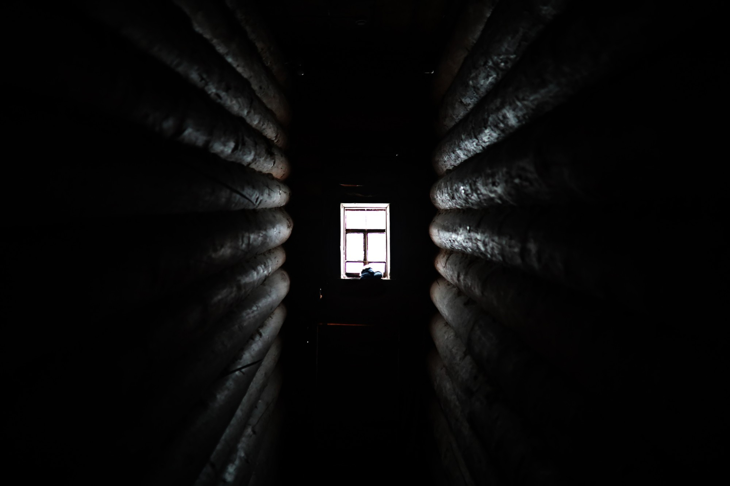 sunlight coming through wooden window old dark room