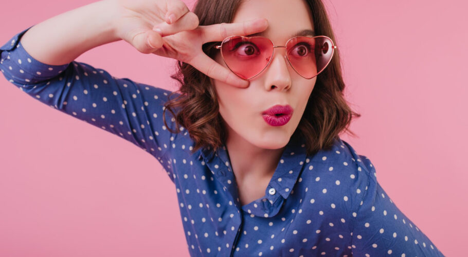 surprised female heart glasses posing with kissing face expression good humoured dark haired girl tamsen having fun