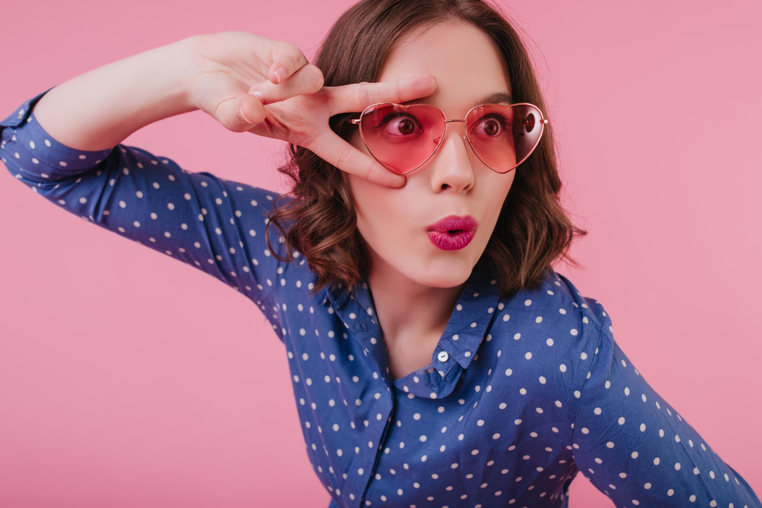 surprised female heart glasses posing with kissing face expression good humoured dark haired girl tamsen having fun