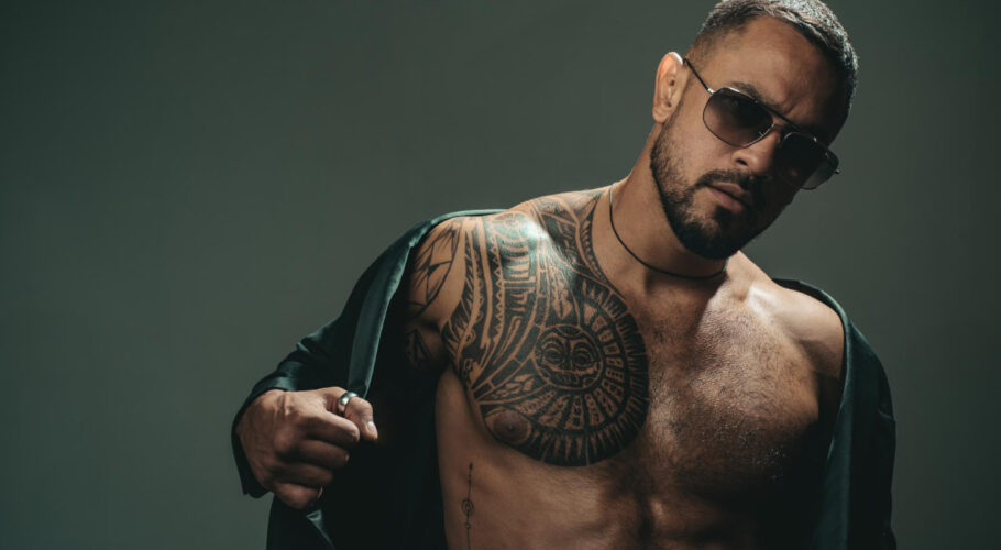 tattoo muscular hispanic man with tattoo chest strong latino man with tattoo skin tattooed guy with muscle torso tattoo
