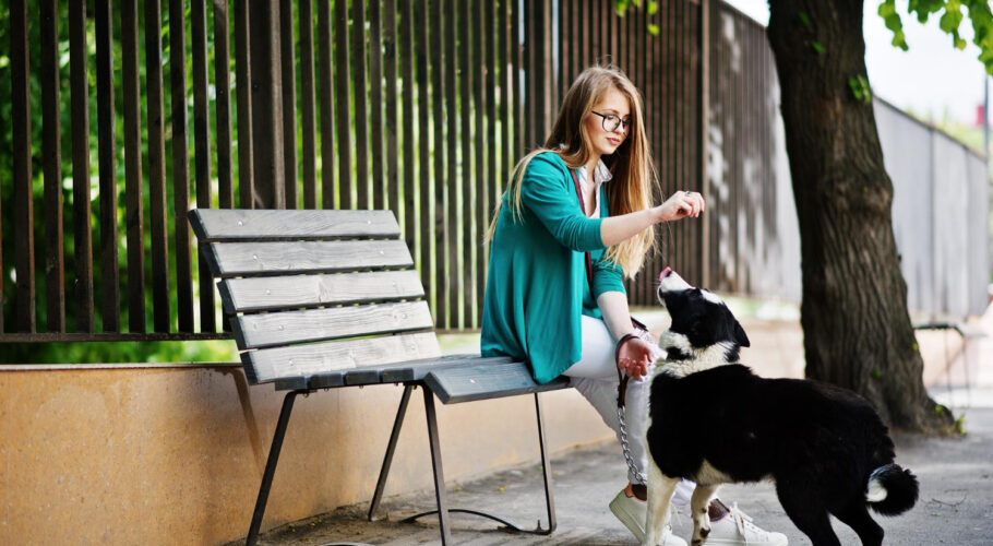 trendy girl glasses ripped jeans with russoeuropean laika husky dog leash
