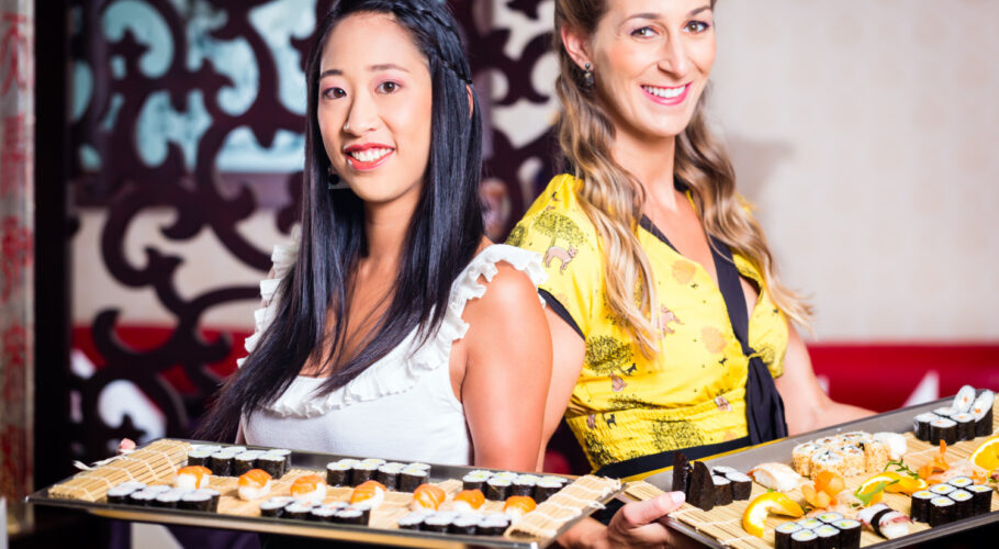 waitress with sushi asian restaurant china
