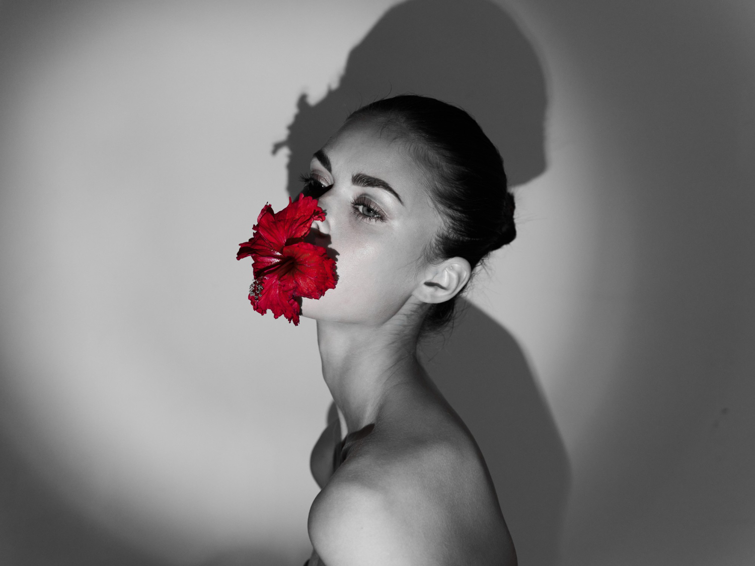 phoenix woman naked shoulders red flower her mouth black white photo