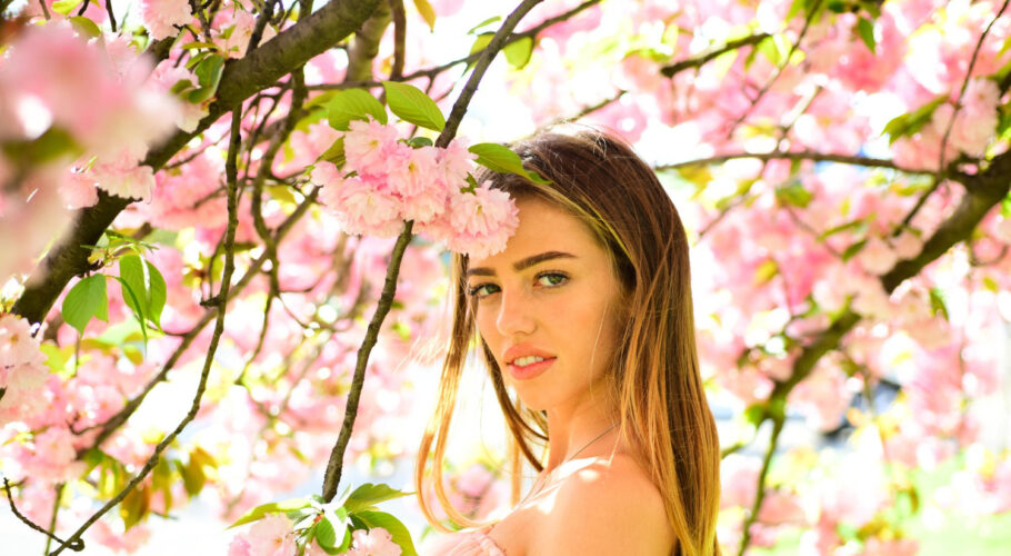 woman posing japanese cherry beauty sexy girl enjoying fragrance flowery tree portrait lovely blond female with full lips lyssa