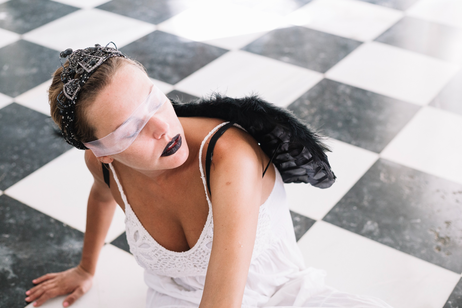 woman with black wings crown