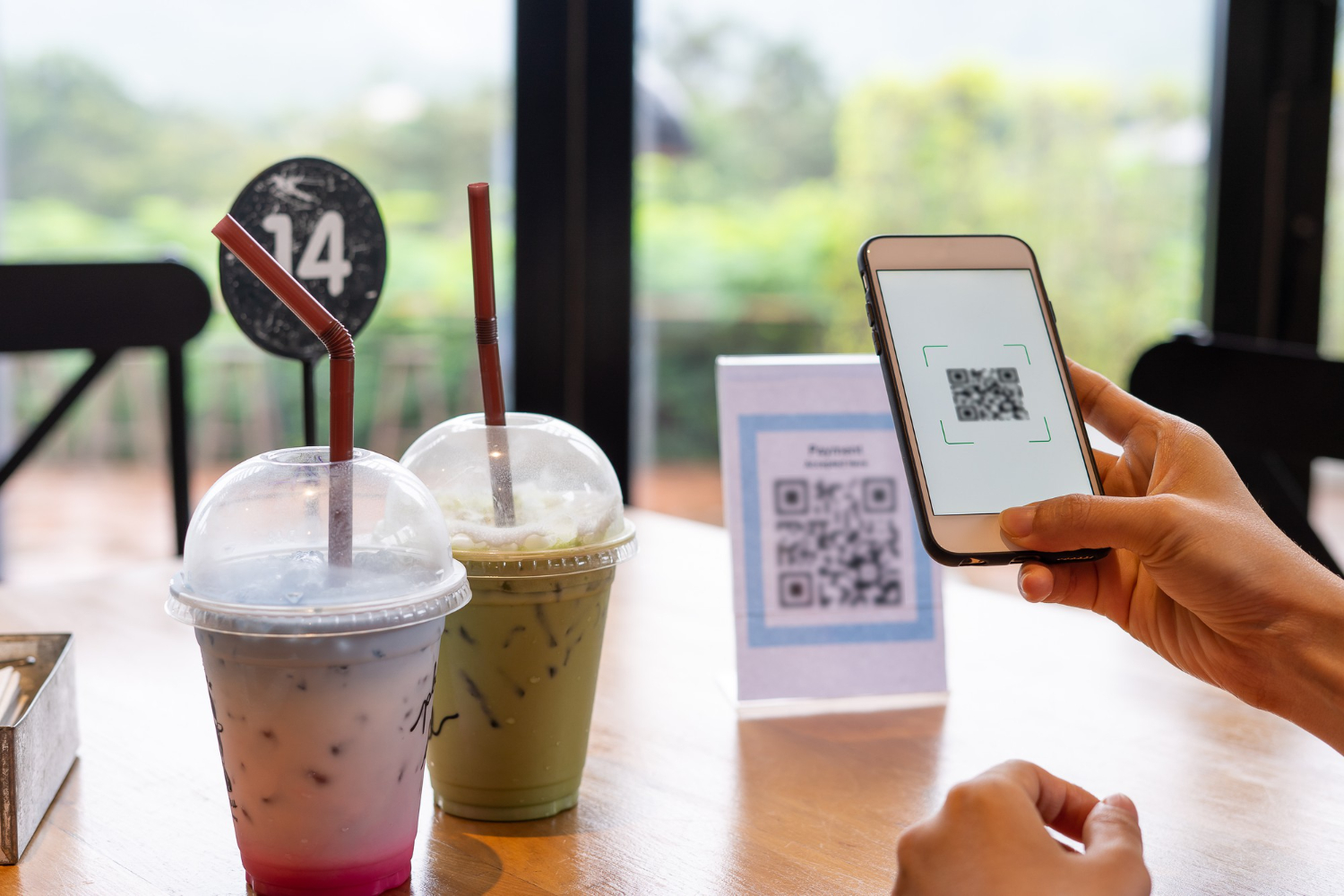 womens hands are using phone scan qr code select food menu in china