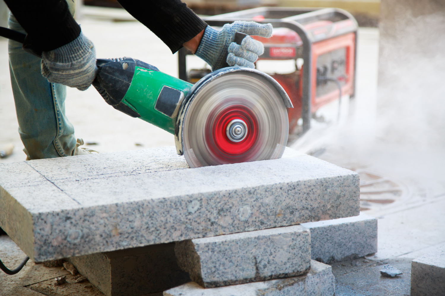 worker with angle grinder