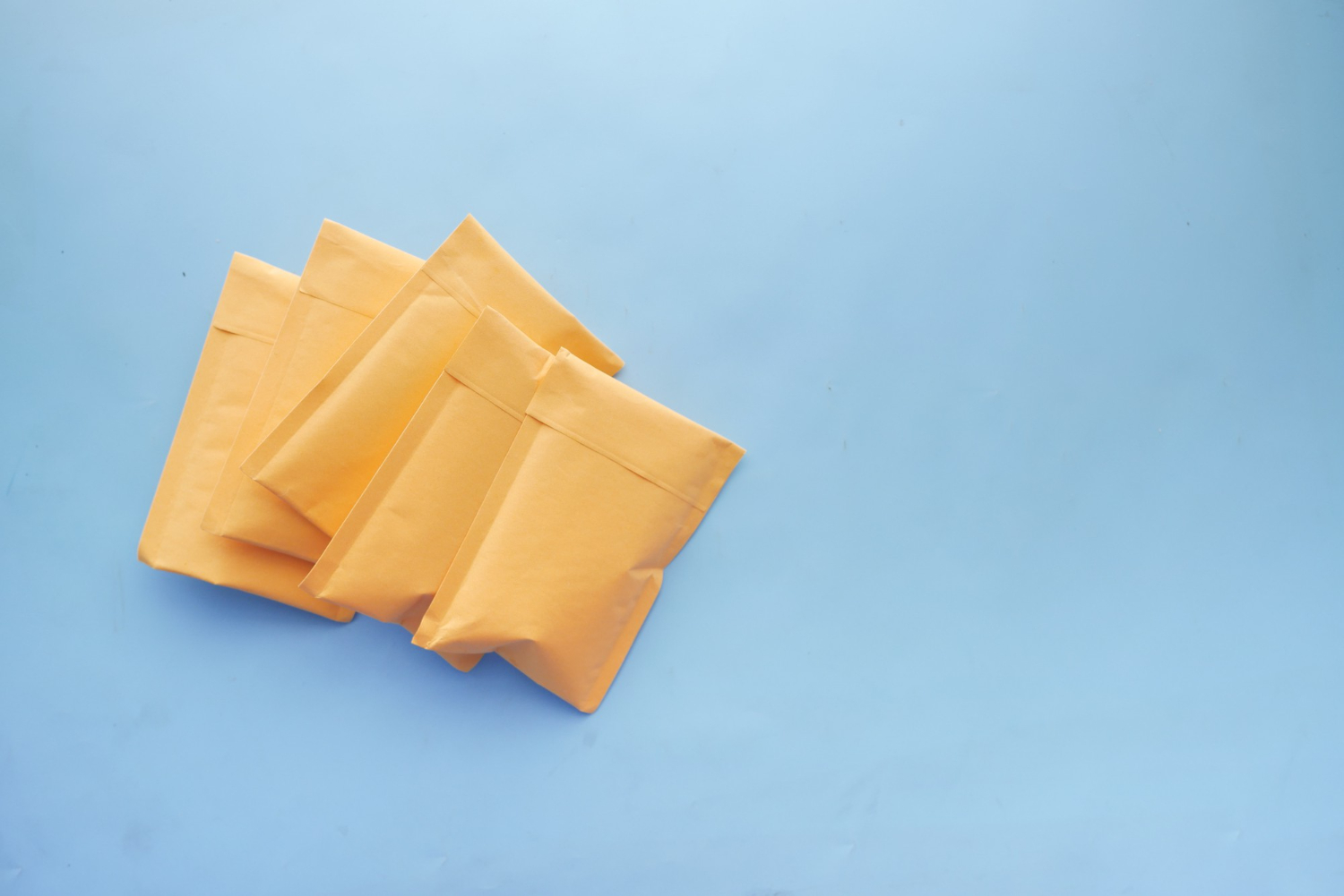 yellow paper bubble envelope blue