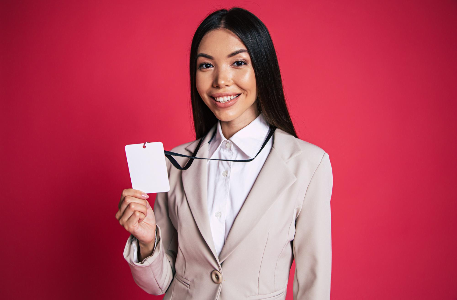 young excited shouting asian business woman suit glasses stands with company access card